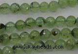 CRU152 15.5 inches 8mm faceted round green rutilated quartz beads