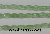 CRU165 15.5 inches 5*8mm faceted rice green rutilated quartz beads