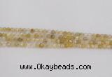 CRU666 15.5 inches 4mm faceted round golden rutilated quartz beads