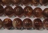 CSS553 15.5 inches 7mm round natural golden sunstone beads