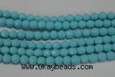 CTU1220 15.5 inches 4mm faceted round synthetic turquoise beads