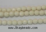 CTU1442 15.5 inches 6mm faceted round synthetic turquoise beads