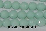 CTU2574 15.5 inches 10mm faceted round synthetic turquoise beads