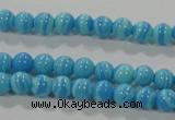 CTU2580 15.5 inches 4mm round synthetic turquoise beads