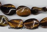 CTW69 15.5 inches 15*20mm twisted oval yellow tiger eye beads