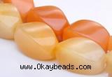 CYJ40 10*14mm twisted rice yellow jade gemstone beads Wholesale