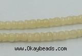 CYJ63 15.5 inches 6*7mm vase-shaped yellow jade gemstone beads wholesale