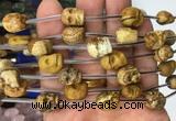 FGBS106 15 inches 10mm carved skull picture jasper beads wholesale