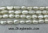 FWP285 15 inches 9mm - 10mm baroque white freshwater pearl strands