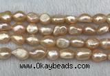 FWP290 15 inches 10mm - 11mm baroque pink freshwater pearl strands