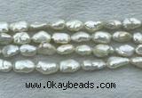 FWP353 15 inches 9mm - 10mm baroque white freshwater pearl strands